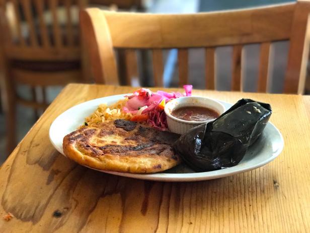 Full breakfast plate of Banana Leaf Wrapped Tamales, Pupusas and Chile Relleno's at Tune Up Cafe in Santa Fe, New Mexico