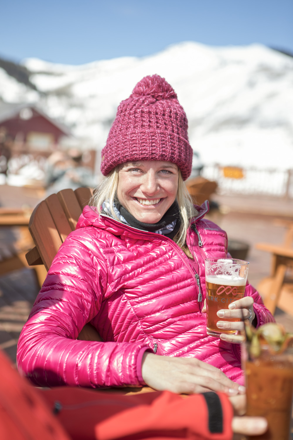 Woman enjoys apres ski at park city mountain resort