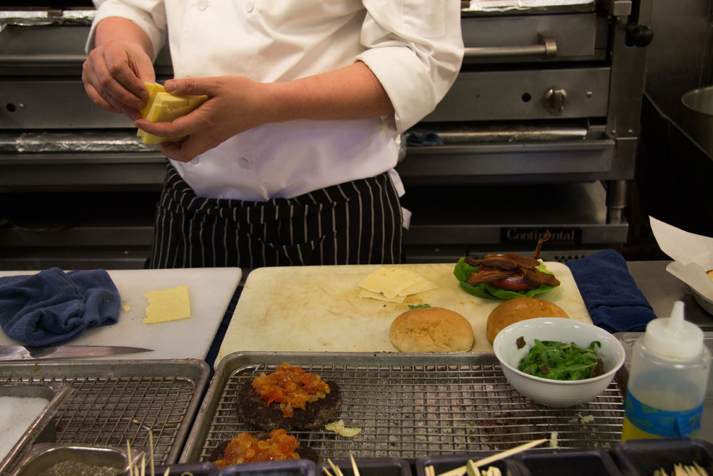 Chef Preparing a Burger