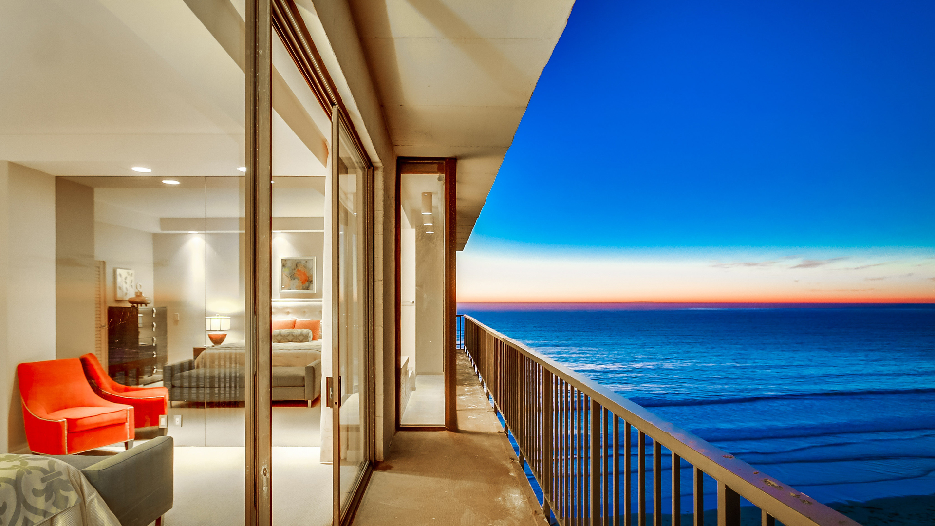 balcony at capri by the sea with view of ocean sunset