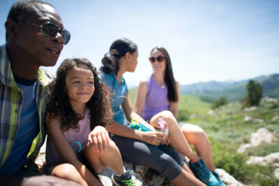 A Happy Family Takes a Break from Hiking in Park City, Utah