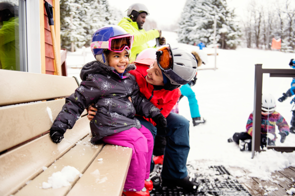 family-on-ski-vacation_opt-600x400 Mother Checking in on Child on a Bench in the Snow