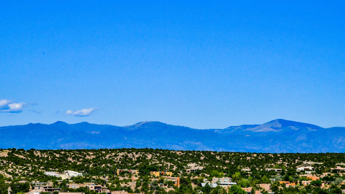 mountain and valley view from fort marcy hotel suites in santa fe new mexico