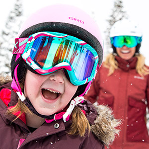 Mother and Child Wearing Ski Goggles