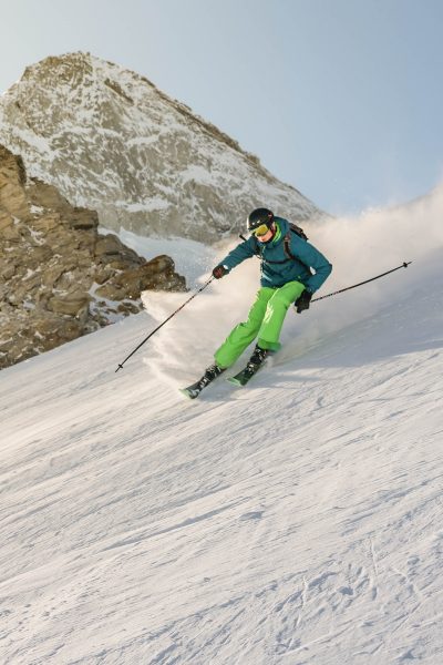 A Woman Shredding Powder in Park City