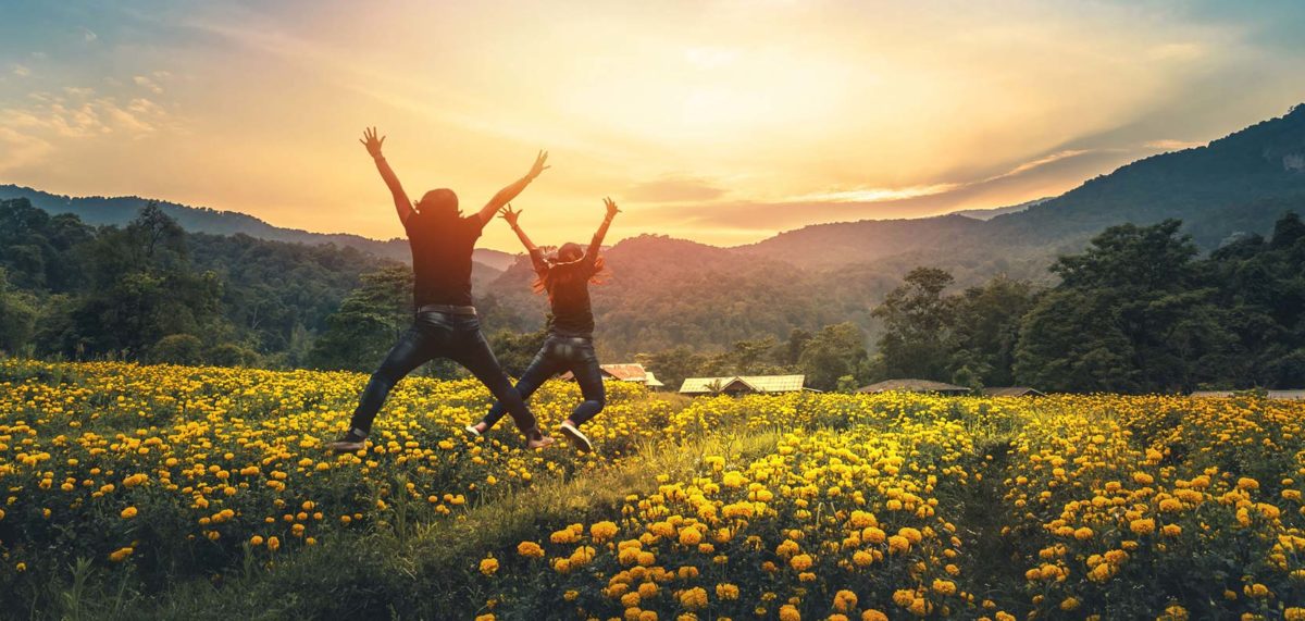 summer-jumpingflowers-1200x571 Friends Jumping in a Field of Wild Flowers
