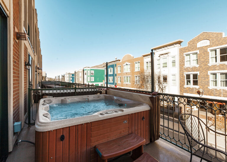 Hot tub views over Main Street from your standard one-bedroom condominium at The Caledonian