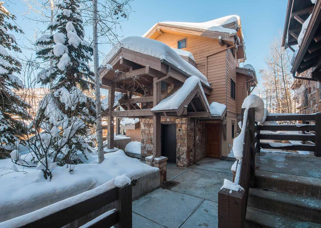 Snowy Building Exterior at Portico Townhome in Park City Utah