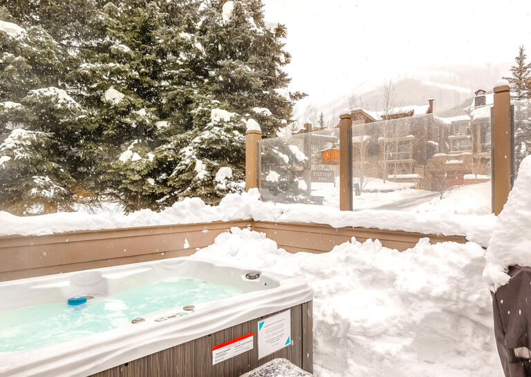 hot tub with a snowy view