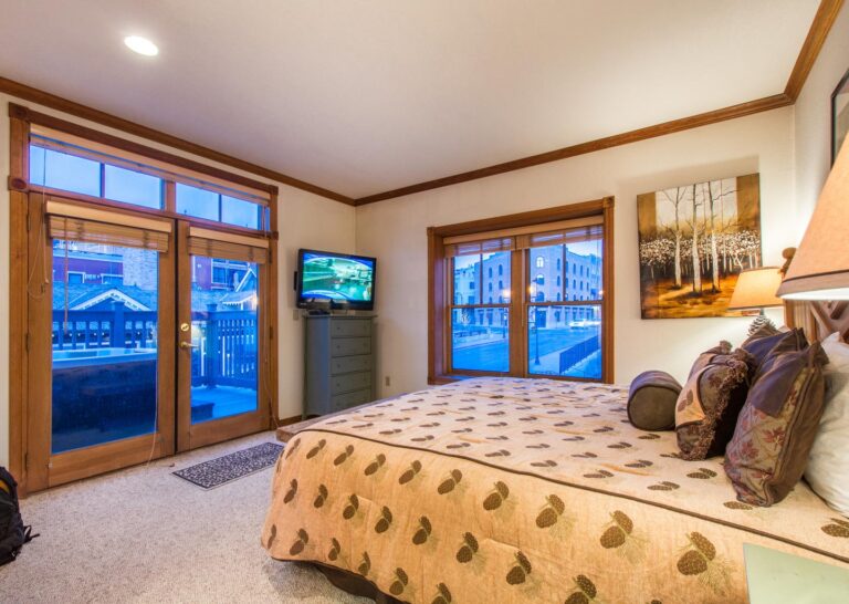 Master Bedroom at Town Lift Condominium with Hot Tub on Porch and View of Main Street Park City