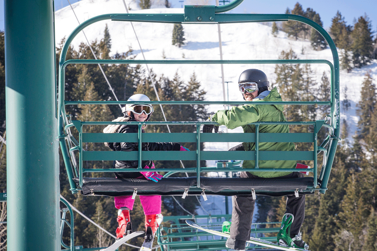 Father and daughter on Park City ski lift