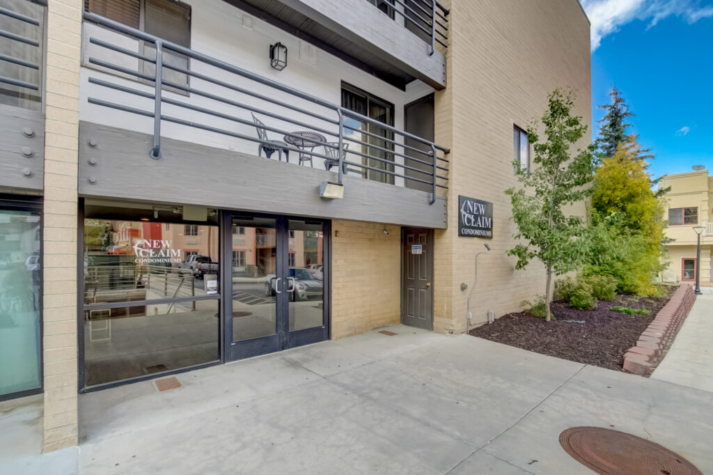 Exterior view of the entrance doors to New Claim