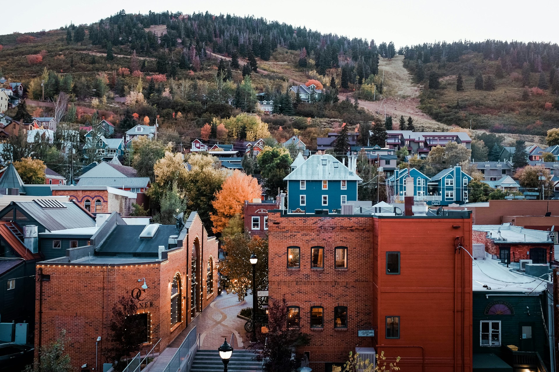 Aerial view of city street and mountain