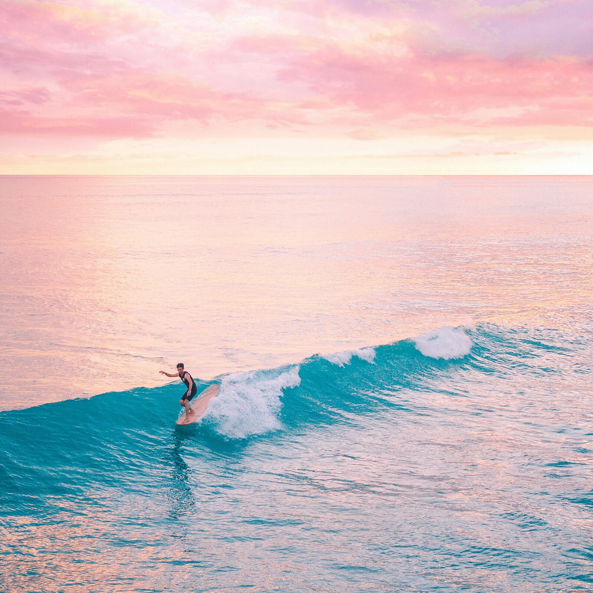 surfing longboard at pacific beach, ca
