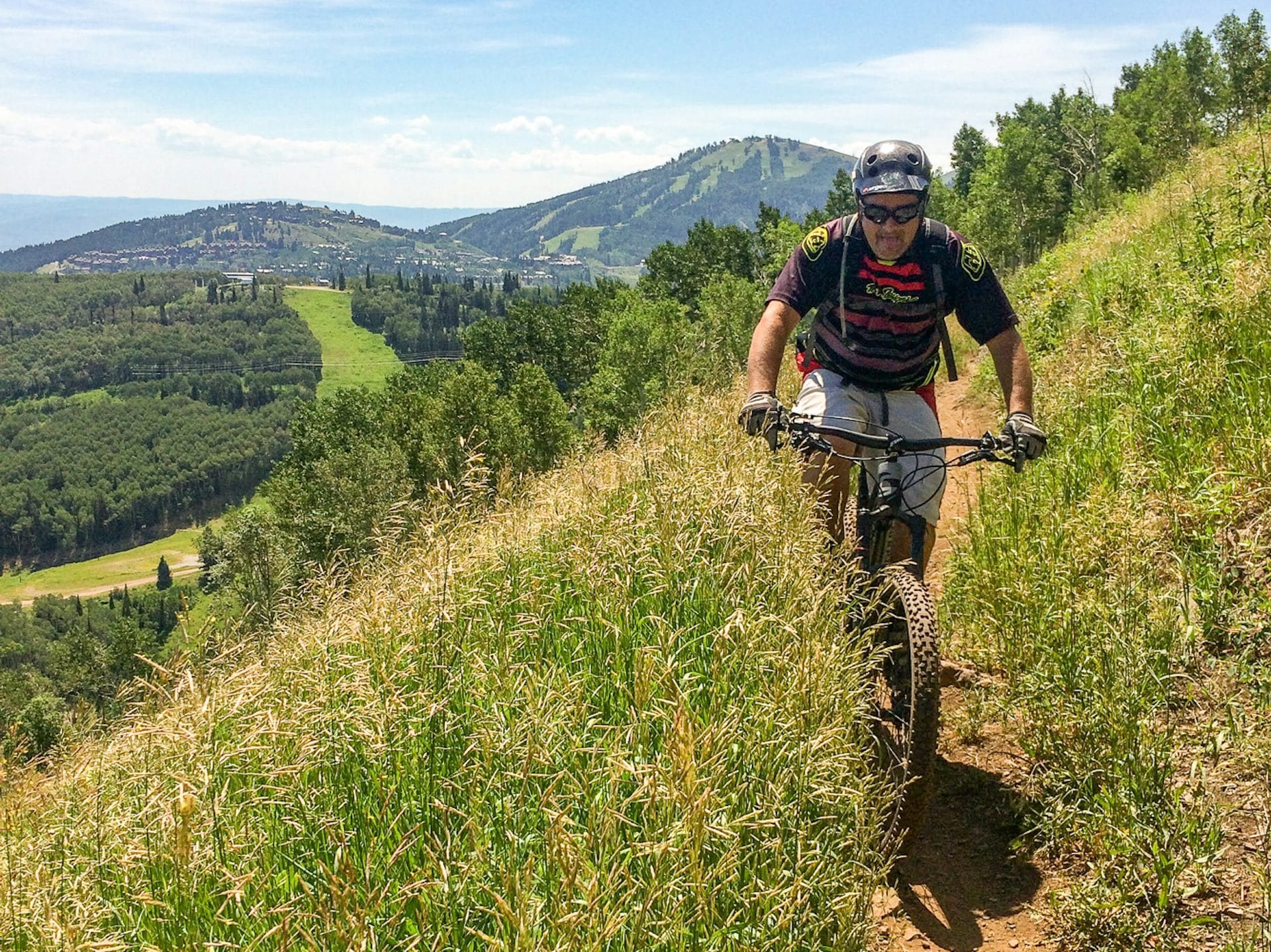 Mountain biking with Deer Valley's Bald Mountain in the background