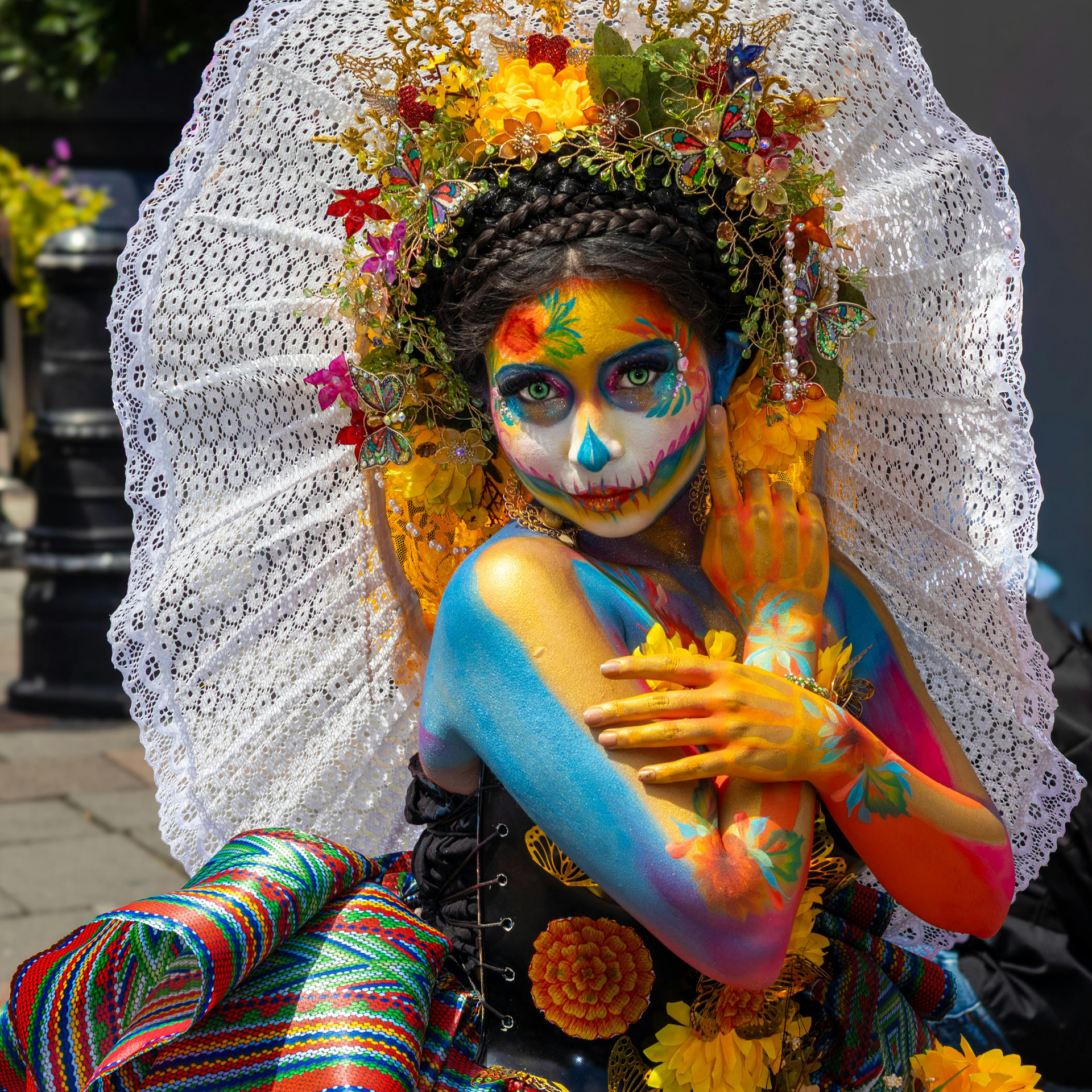 Marigolds and candlelight during Dia de los Muertos on the Santa Fe Plaza