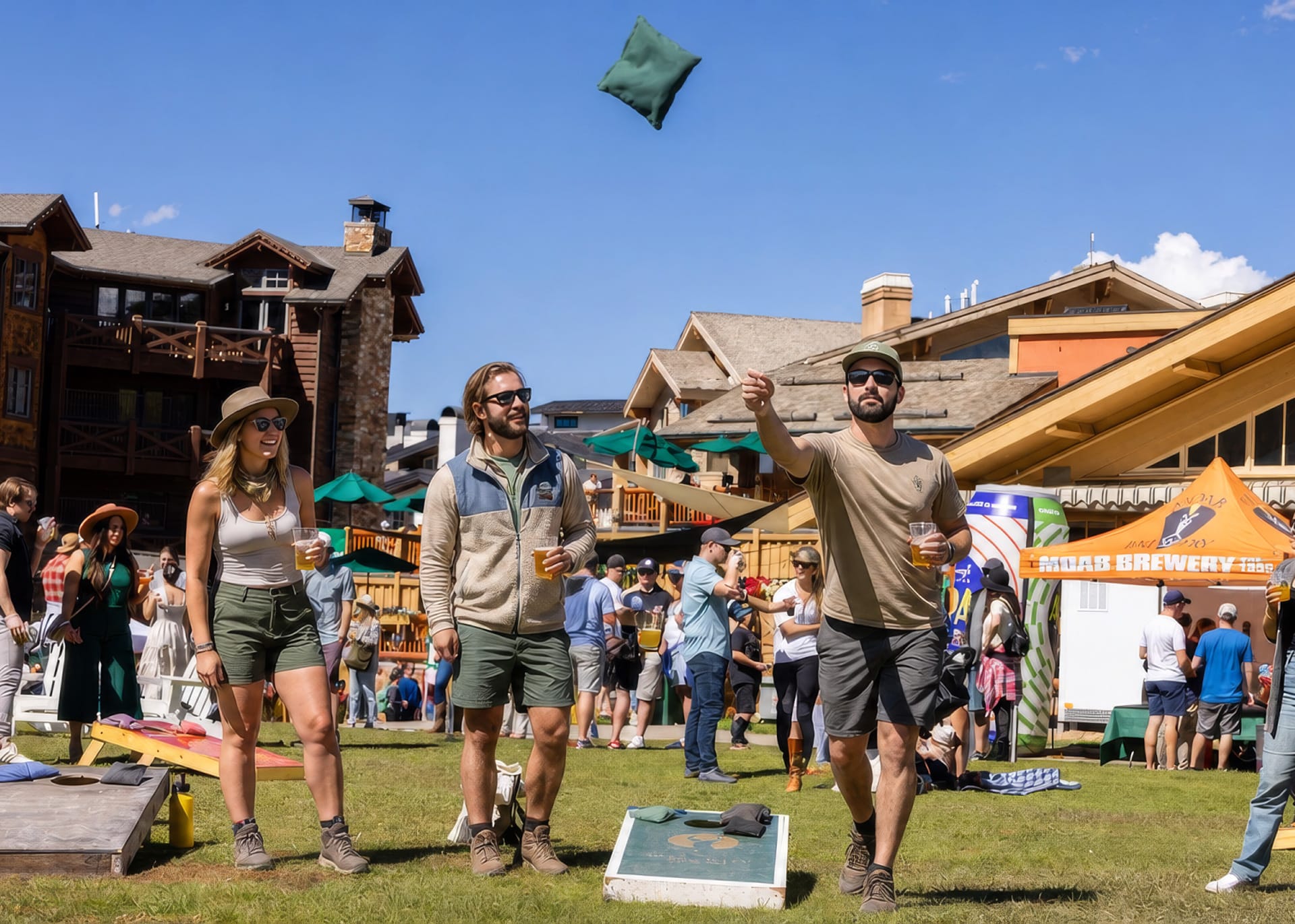 Guests playing cornhole at the Deer Valley Mountain Beer Festival