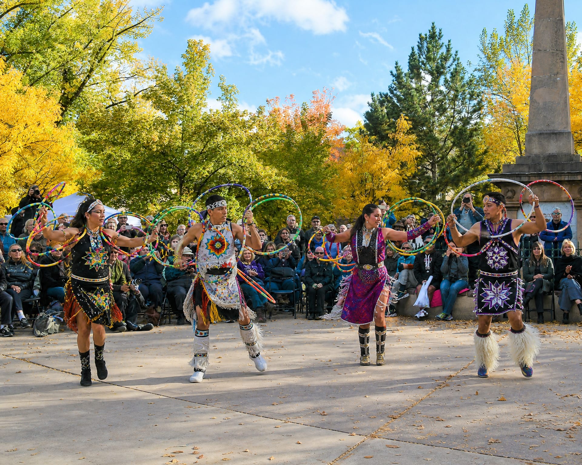 Hoop dancers performing at the Honoring Native Nations Powwow on the Santa Fe Plaza