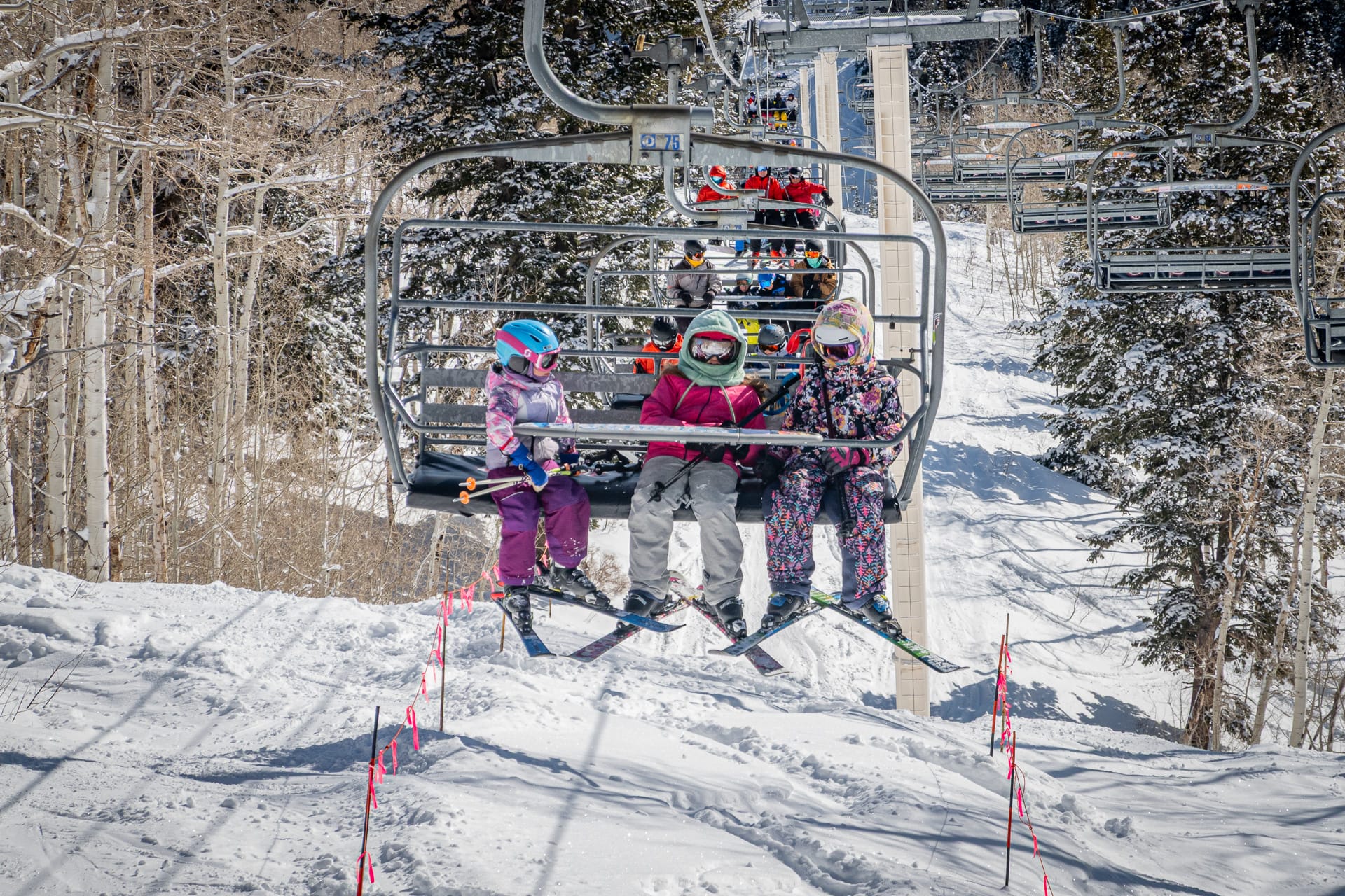 Family skiing at Canyons Village in Park City with the Ski Utah Passport